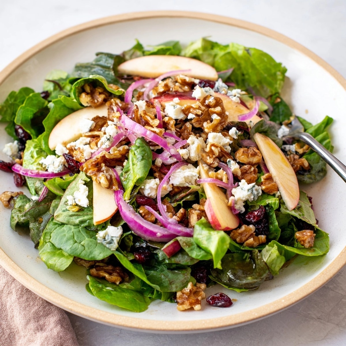 Close-up shot of Autumn Harvest Apple Feta Salad: sweet, savory, and colorful fall bounty.
