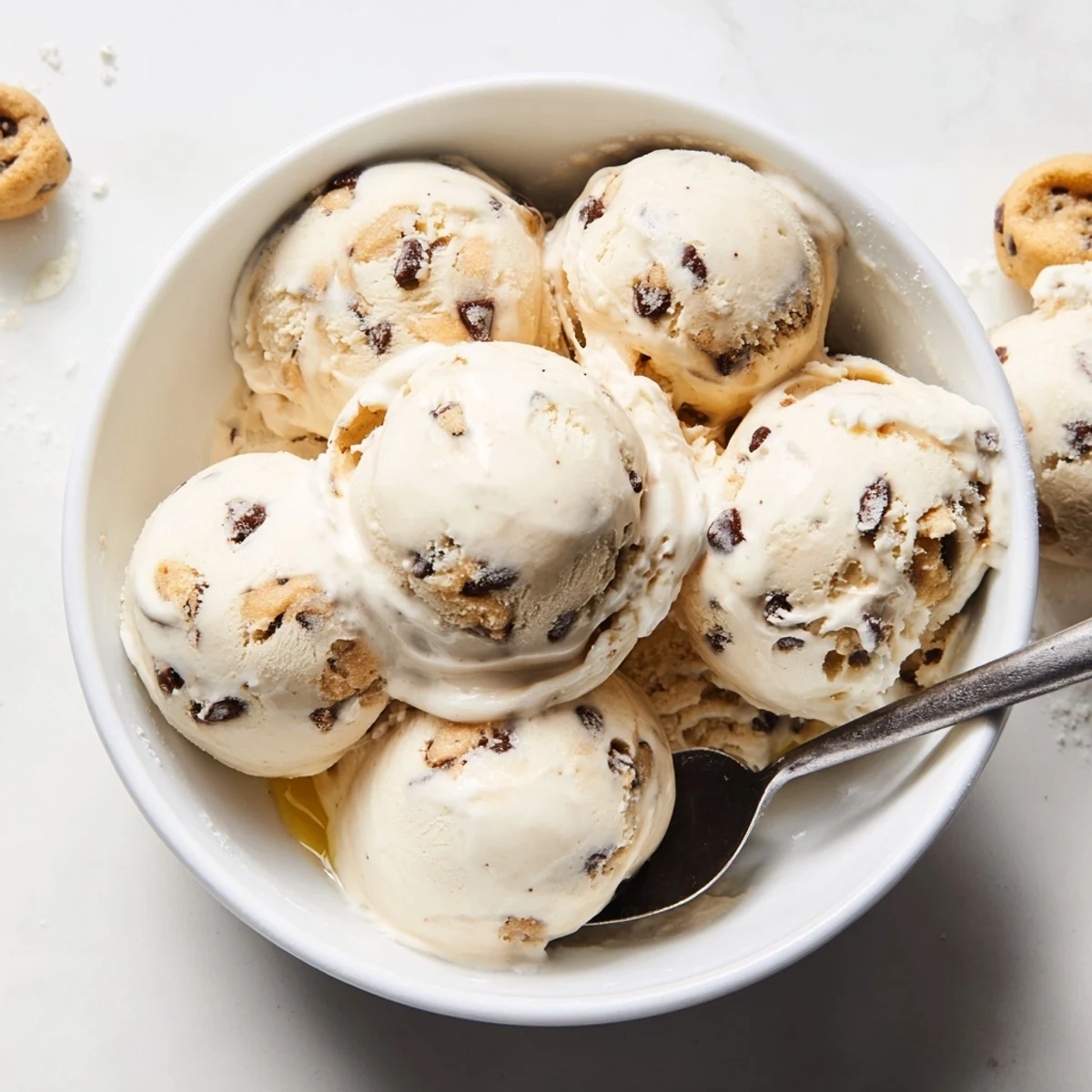 Creamy Cottage Cheese Ice Cream with Cookie Dough bites served in a bowl.  