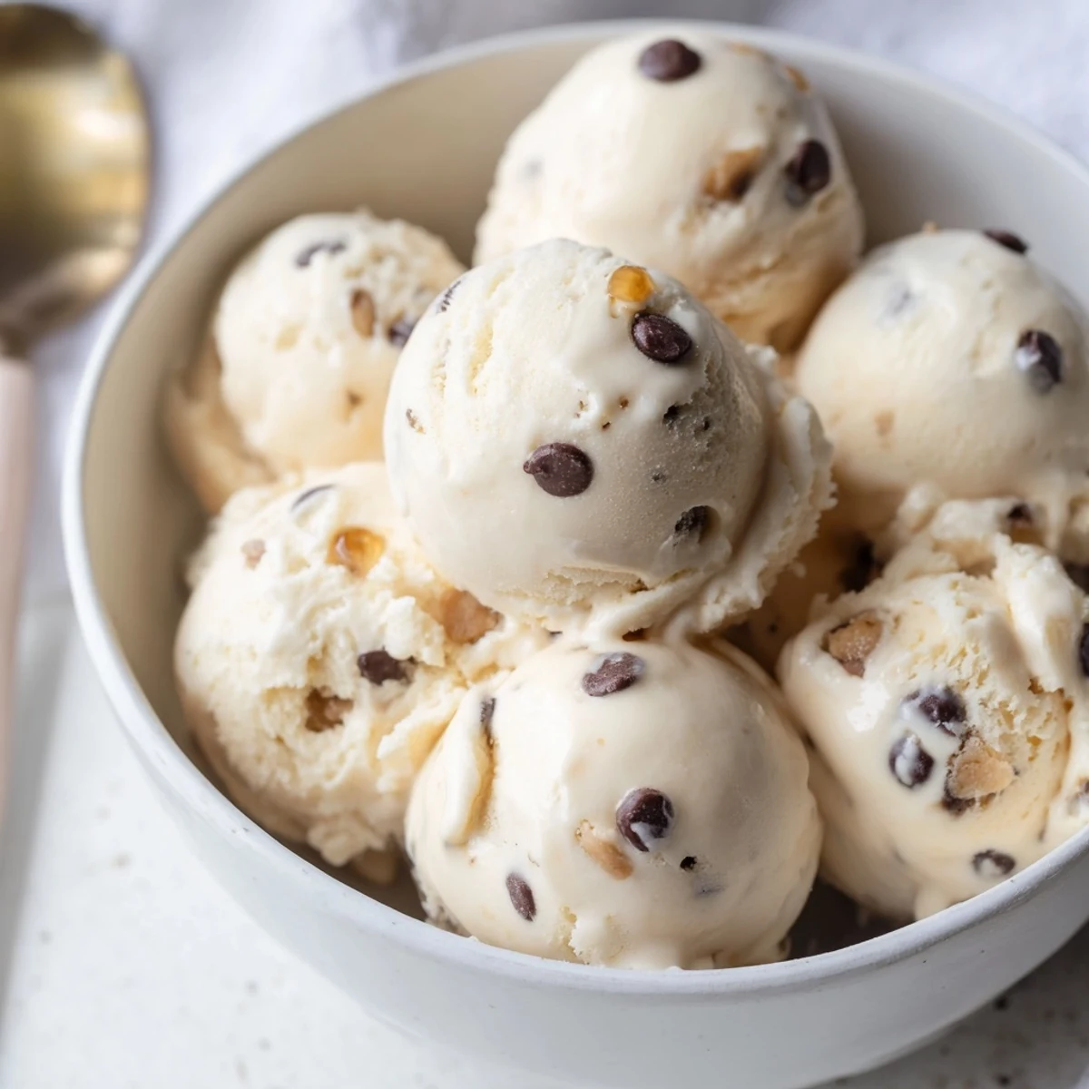 Delicious Cottage Cheese Ice Cream blended with sweet, edible cookie dough morsels.