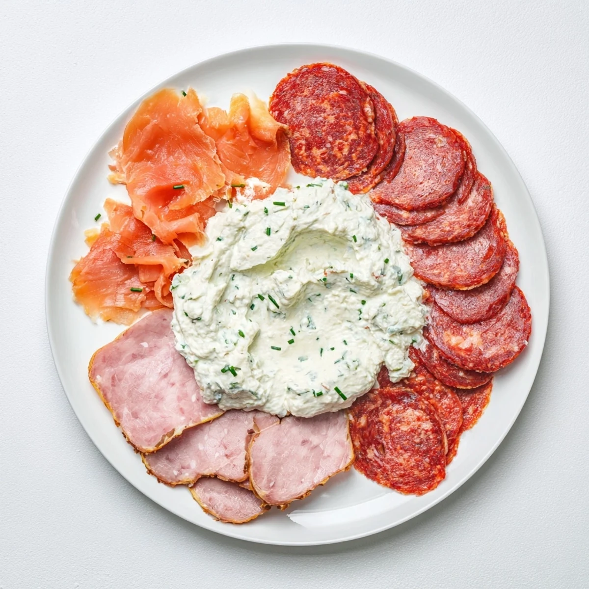 Visualize the savory Compass Rose with cured meats, showcasing a rich international flavor profile.