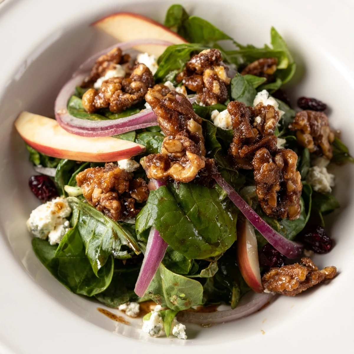Close-up of a festive Gingerbread Spiced Candied Pecan Salad, perfect for Thanksgiving or a winter dinner.