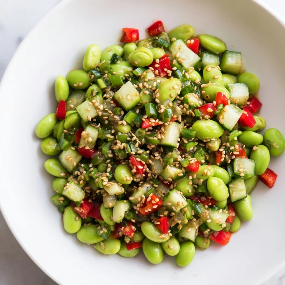 A close-up shot of a colorful edamame salad bowl, perfect for a light Asian-inspired meal.