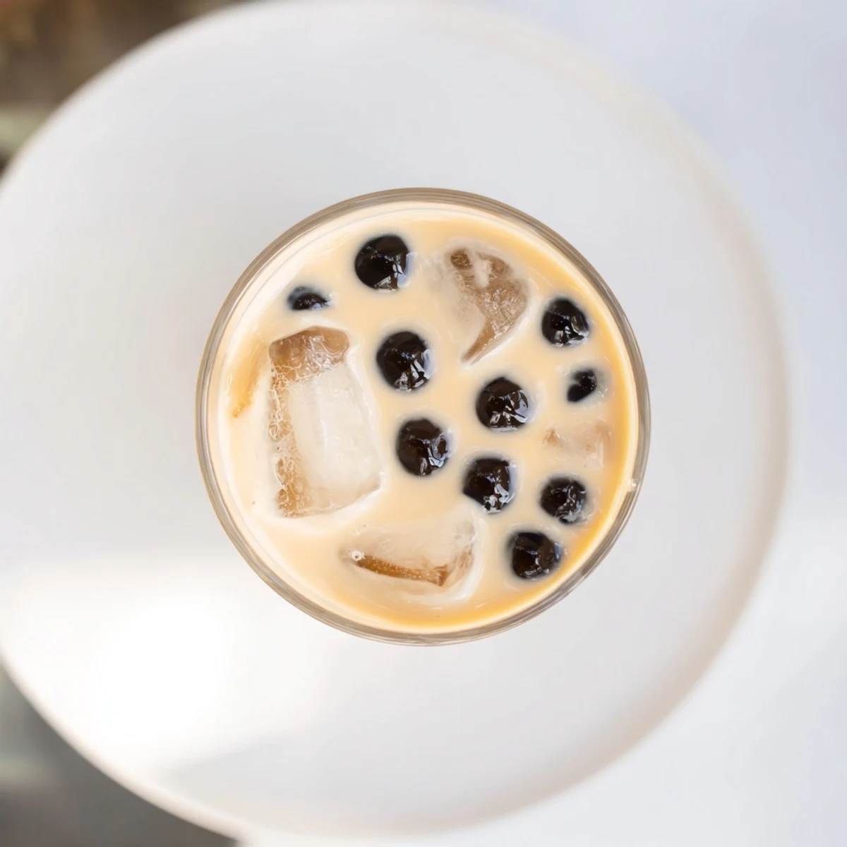 Enjoy a vibrant picture of this rich Boba Tea Hack recipe, featuring luscious tapioca pearls swirled in milk.