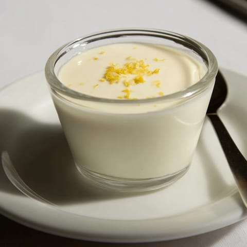 Silky smooth 3-Ingredient Lemon Posset, the perfect tangy dessert, ready to be served cold.