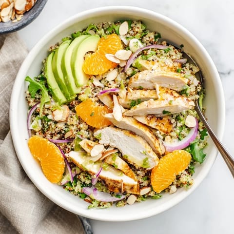 Juicy orange segments and creamy avocado add brightness to this wholesome, gluten-free salad bowl for a healthy meal.
