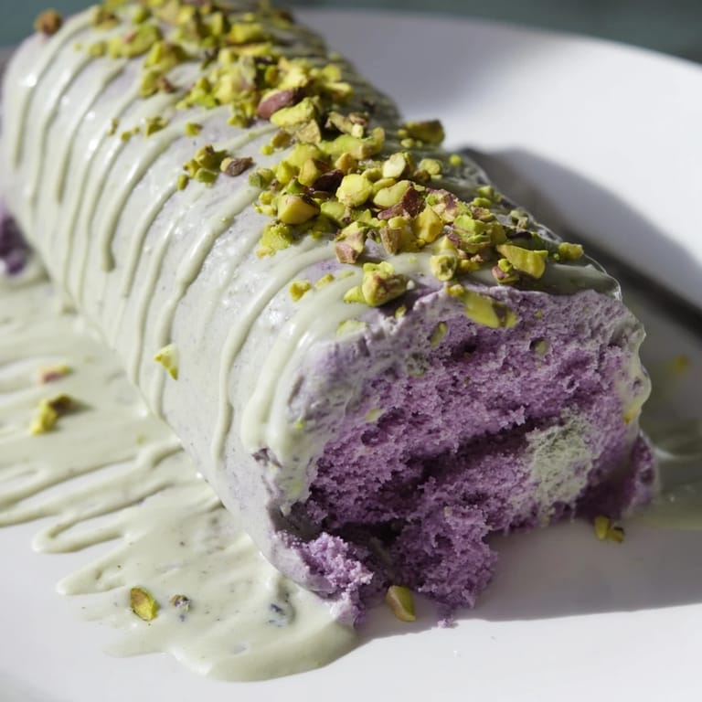 Creamy ube & pistachio ice cream bars, layered for a colorful summer treat.  